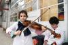Entrega de instrumentos musicales a niños y niñas presupuesto participativo en la escuela Portugal 